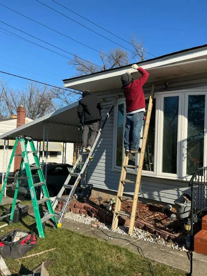 Restoration crew performing exterior repair in East Brunswick
